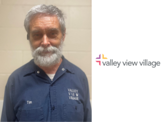 Tim, the assistant environmental services director, at Valley View Village poses for a picture.